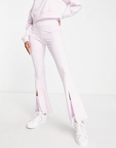 Pantaloni a zampa con spacco sul davanti stile aerobica anni '80 - adidas Originals - Modalova