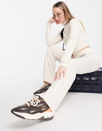 Retro Luxury - Pantaloni a zampa a coste sporco - adidas Originals - Modalova
