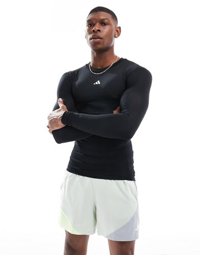 Techfit Compression - Top a maniche lunghe da allenamento - adidas performance - Modalova