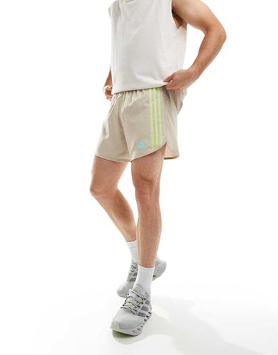 Adidas Running - Own The Run - Pantaloncini beige con 3 strisce - adidas performance - Modalova