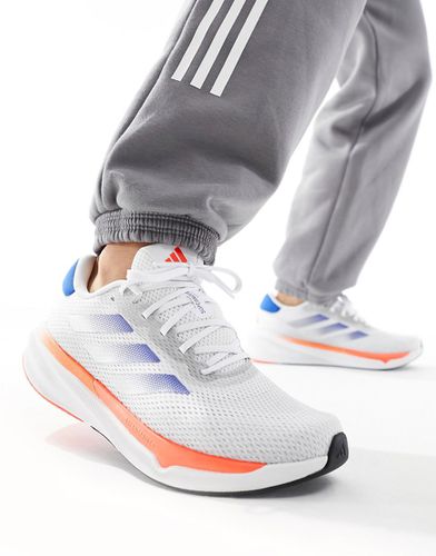 Adidas - Running Supernova Stride - Sneakers bianche e blu - adidas performance - Modalova