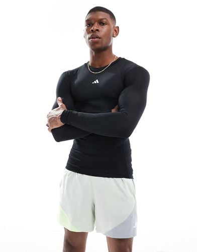 Adidas - Training Techfit - Top a maniche lunghe a compressione - adidas performance - Modalova