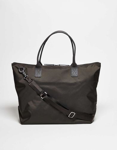 Cabas de voyage unisexe en nylon 36 heures avec bandoulière en cuir - Arket - Modalova