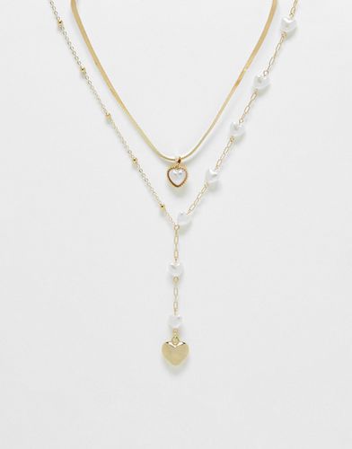 Collana stile lariat con perle a forma di cuore - Ashiana - Modalova