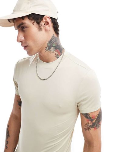 T-shirt da allenamento attillata color pietra con logo - ASOS - Modalova