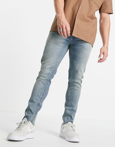 Cone Mill - Jeans skinny "American classic" con fondo grezzo, lavaggio medio vintage - ASOS DESIGN - Modalova