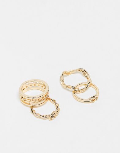 Confezione da 4 anelli dorati con nodo - ASOS DESIGN - Modalova