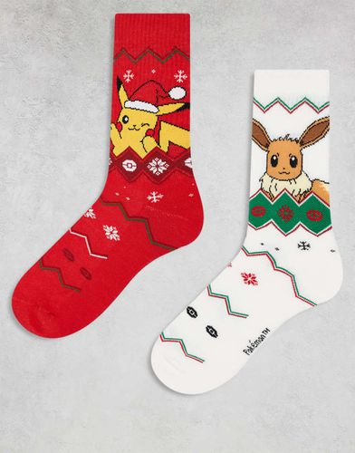 Confezione da 2 paia di calzini natalizi Pokémon con Eevee e Pikachu rossi ed écru - ASOS DESIGN - Modalova