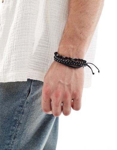 Confezione da 3 bracciali in perline ematite e corda neri - ASOS DESIGN - Modalova
