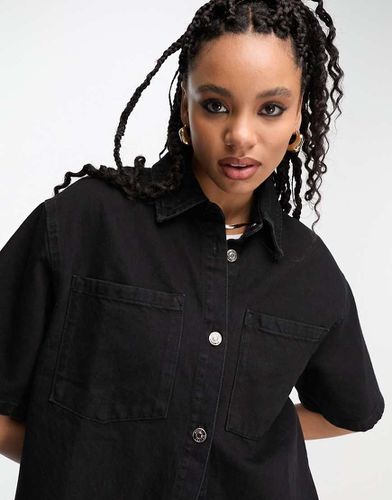 Camicia taglio lungo in denim nero slavato - ASOS DESIGN - Modalova