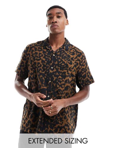 Camicia vestibilità comoda leopardata e nera con rever - ASOS DESIGN - Modalova