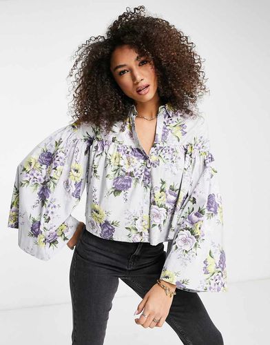 Camicia grembiule con maniche voluminose e stampa floreale - ASOS DESIGN - Modalova