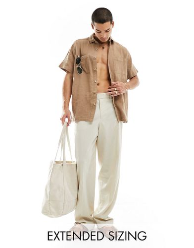 Camicia in mussola a maniche corte vestibilità comoda con colletto a rever - ASOS DESIGN - Modalova