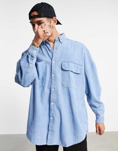 Camicia oversize in denim con lavaggio medio vintage - ASOS DESIGN - Modalova