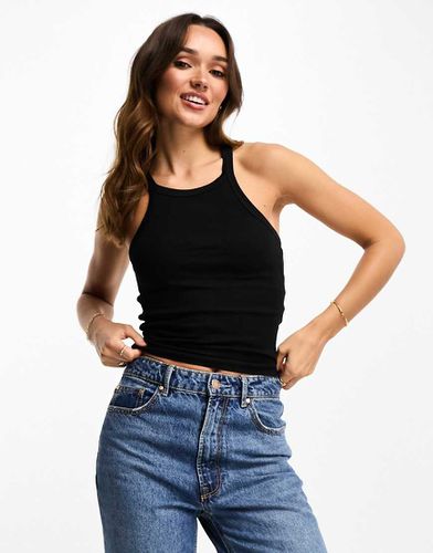 Canotta nera skinny con spalline - ASOS DESIGN - Modalova