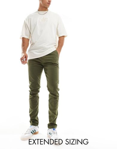 Chino skinny color kaki scuro slavato - ASOS DESIGN - Modalova