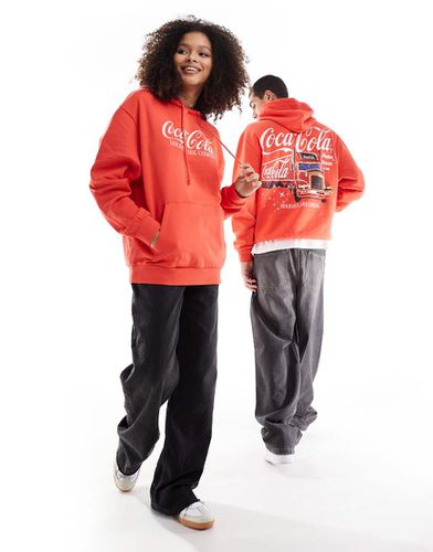 Christmas - Felpa con cappuccio oversize unisex rossa con stampe Coca Cola a tema natalizio - ASOS DESIGN - Modalova