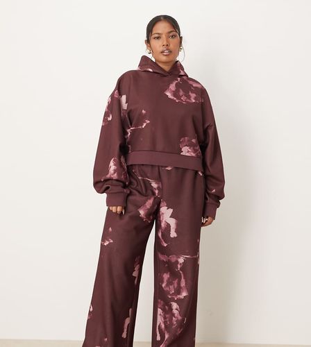 ASOS DESIGN Curve - Pantalon de jogging droit d'ensemble à motif fleurs intégral - Prune - Asos Curve - Modalova