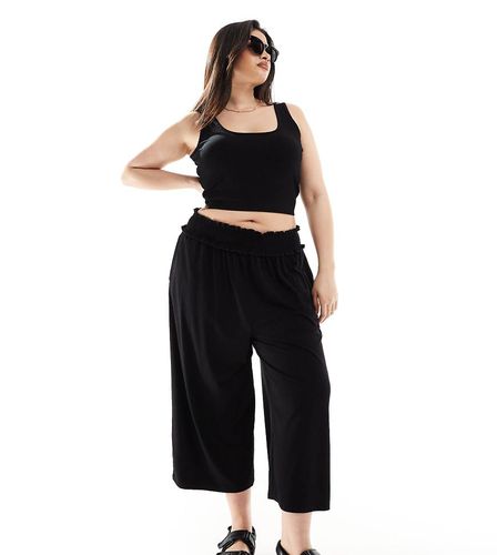 ASOS DESIGN Curve - Pantaloni culotte taglio corto neri con vita arricciata - ASOS Curve - Modalova