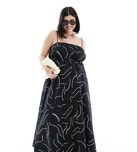 ASOS DESIGN Curve - Prendisole lungo con bustino arricciato e spalline regolabili nero con stampa astratta bianca - ASOS Curve - Modalova