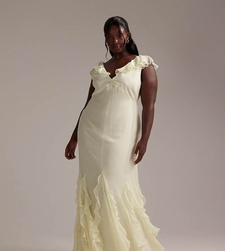 ASOS DESIGN Curve - Robe longue de demoiselle d'honneur coupée en biais avec manches évasées et ourlet à godets volantés - pâle - Asos Curve - Modalova