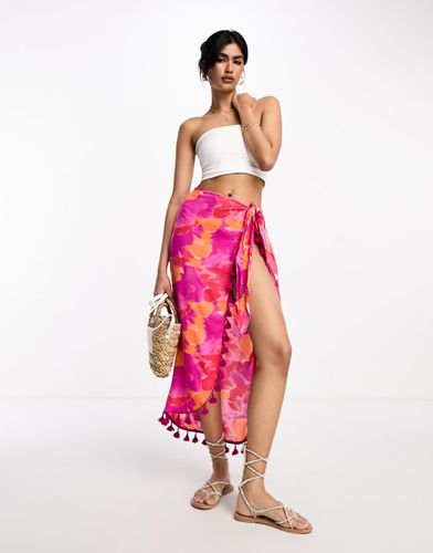 Gonna pareo midi a fiori sfumati vivaci con nappe - ASOS DESIGN - Modalova