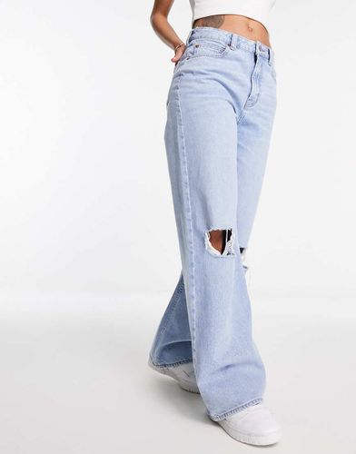 Dad jeans azzurri a fondo ampio con strappi - ASOS DESIGN - Modalova