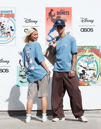 Disney - T-shirt unisex oversize slavato con stampa di "Donald Duck" - ASOS DESIGN - Modalova