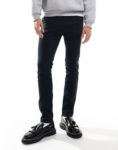 Essential - Chino skinny neri - ASOS DESIGN - Modalova