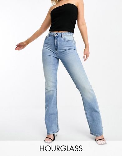 Hourglass - Jeans a zampa lavaggio chiaro - ASOS DESIGN - Modalova