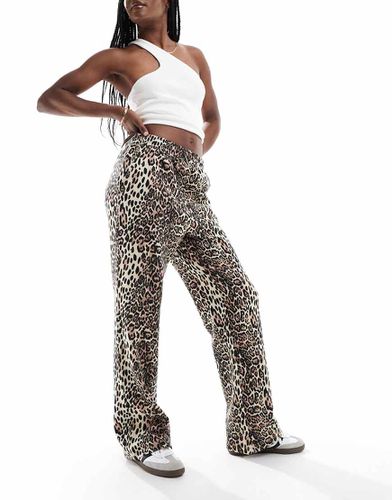 Joggers dritti leopardati - ASOS DESIGN - Modalova