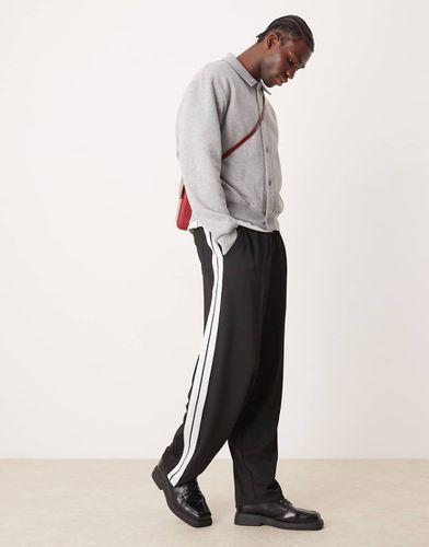 Joggers eleganti super ampi neri con fettucce a contrasto - ASOS DESIGN - Modalova