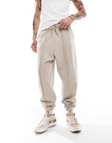 Joggers oversize beige slavato con dettaglio di cuciture - ASOS DESIGN - Modalova