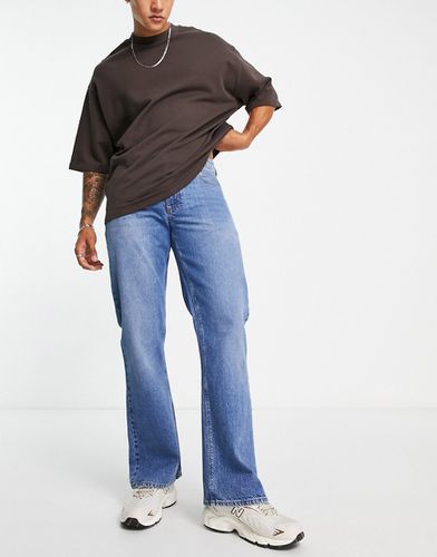 Jeans bootcut rétro lavaggio medio - ASOS DESIGN - Modalova