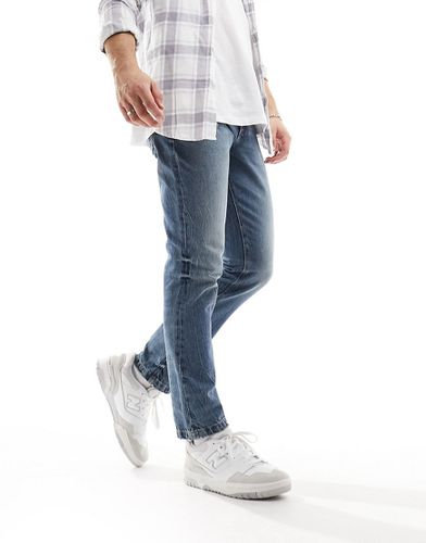 Jeans skinny lavaggio rétro - ASOS DESIGN - Modalova