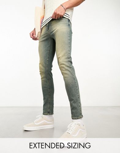 Jeans skinny lavaggio scuro Y2K - ASOS DESIGN - Modalova
