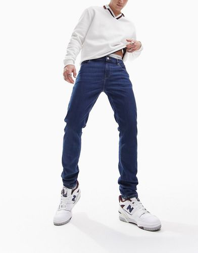 Jeans skinny lavaggio scuro flat - ASOS DESIGN - Modalova