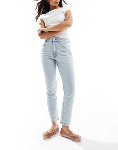 Mom jeans confortevoli slim chiaro - ASOS DESIGN - Modalova