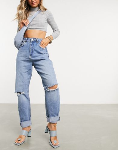 Mom jeans extra larghi a vita alta lavaggio medio con strappi - ASOS DESIGN - Modalova