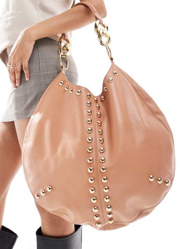 Maxi borsa arrotondata in pelle premium pesca con borchie - ASOS DESIGN - Modalova