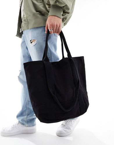 Maxi borsa oversize in cotone pesante nera con manico corto e lungo - ASOS DESIGN - Modalova
