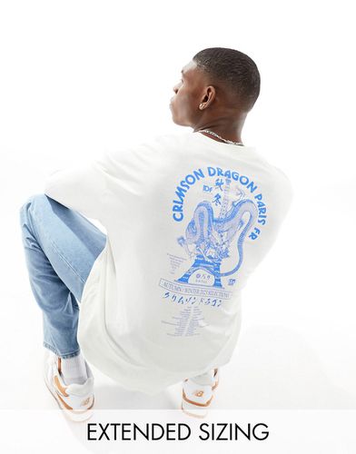 Maglietta a maniche lunghe oversize bianca con stampa "Souvenir" sul retro - ASOS DESIGN - Modalova