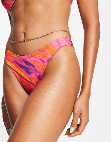 Slip bikini sgambati a vita bassa mix and match con stampa tramonto effetto marmo - ASOS DESIGN - Modalova