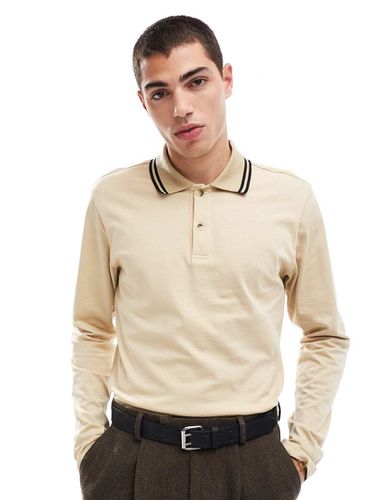 Polo a maniche lunghe beige con righe a contrasto sul colletto - ASOS DESIGN - Modalova