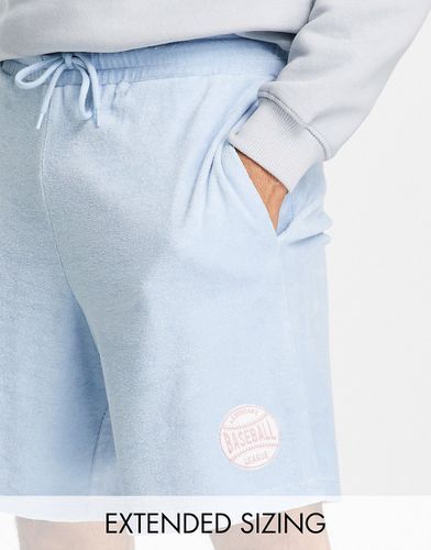 Pantaloncini comodi in spugna con scritta ricamata - ASOS DESIGN - Modalova