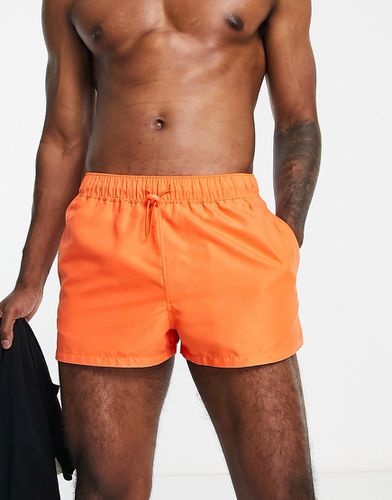Pantaloncini da bagno extra corti arancioni - ASOS DESIGN - Modalova