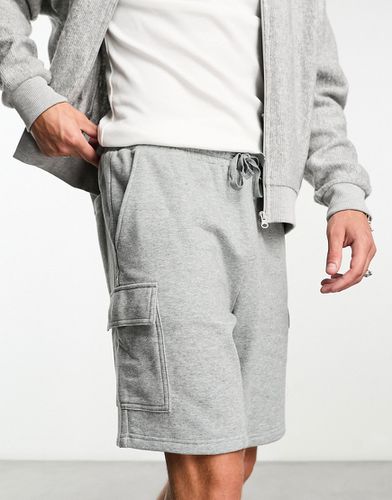Pantaloncini in jersey con tasche cargo mélange - ASOS DESIGN - Modalova