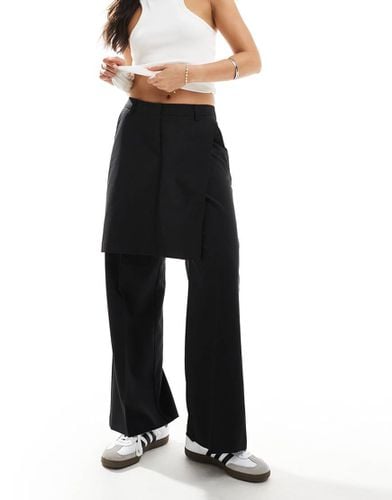 Pantaloni neri sartoriali con gonna sovrapposta - ASOS DESIGN - Modalova