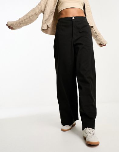 Pantaloni neri strutturati con gamba ampia - ASOS DESIGN - Modalova