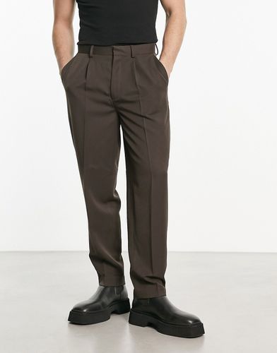 Pantaloni oversize eleganti affusolati marrone cioccolato - ASOS DESIGN - Modalova